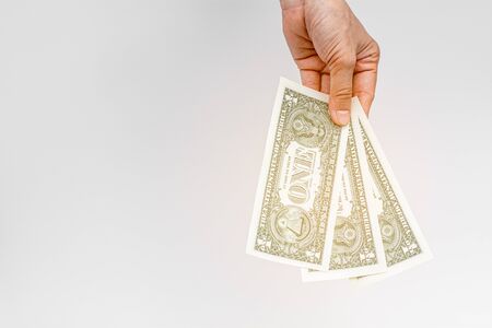 hands giving money on white background.