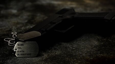 Blank military dog tags and a gun on abandoned rusty metal plate. - Memories and sacrifices concept.の写真素材