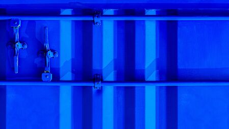 detail of blue industrial shipping container door.の写真素材