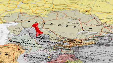Red pin placed at Uzbekistan map. - travel and destination concept.のeditorial素材