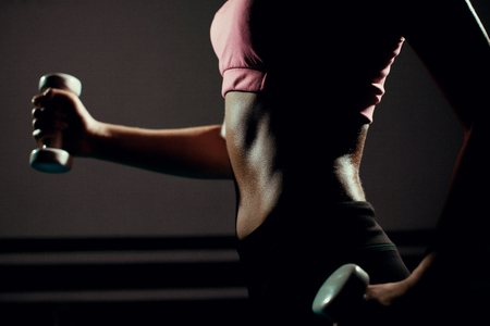 Female fitness model exercisingの写真素材