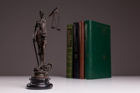 Themis on the background of the books.の写真素材