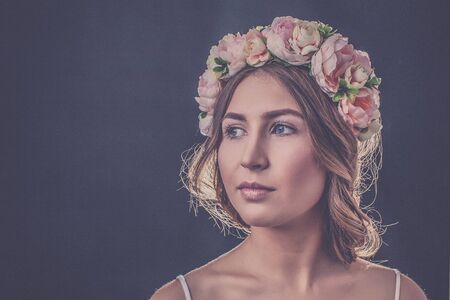 Girl with a wreath on his headの写真素材