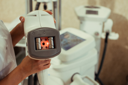 Apparatus for ultrasonic cavitation of the body in the beauty salon. Radio wave lifting of face and bodyの写真素材