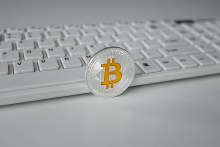 Bitcoin on keyboard background . BTC. cryptocurrency symbol