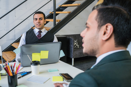 A person is interviewed for a job in a large firm. The concept of the work in the office.