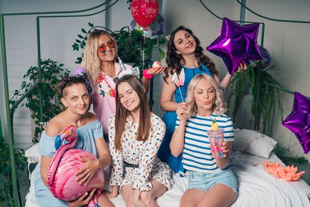 Portrait of a group of beautiful girls on a bachelorette partyの写真素材