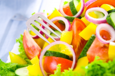 fresh vegetable salad on plateの写真素材