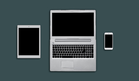 Layout of modern gadgets for web design. Top view of electonic devices: tablet, laptop computer and...