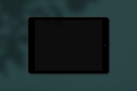 Digital electronic device with mockup screen for your text or advertisement isolated over green...