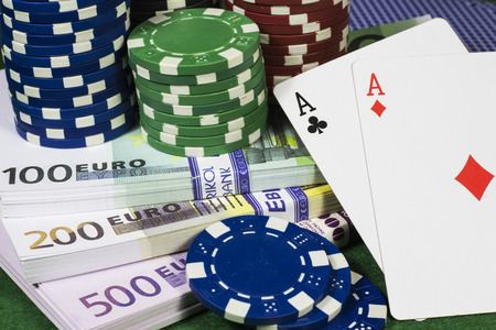 Poker chips with a lot of euros and card