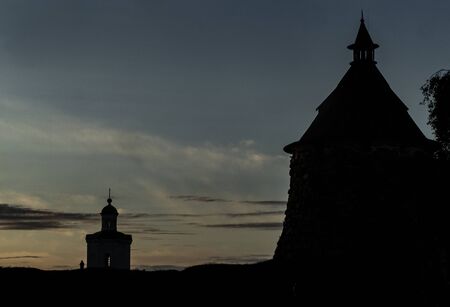 Tower silhouette on sunset sky backgroundの写真素材