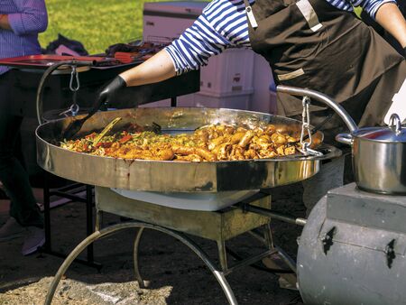 Meat and vegetables cooked on the grill. Streetfood. Hot roast chickenの写真素材