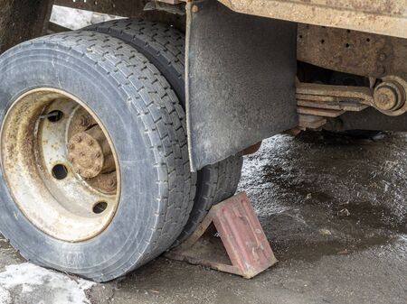 Wheel of an old truck locked. Old abandoned lorry