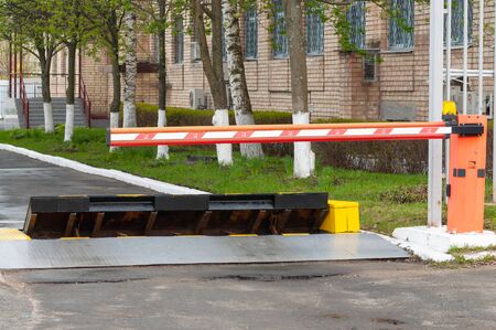 barrier and automatic road blocker locks access to the protected area