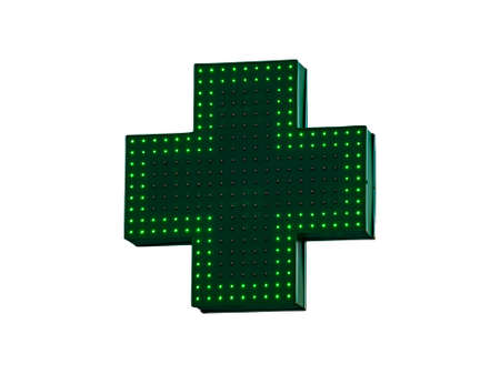 Green medical cross sign isolated on white backgroundの写真素材