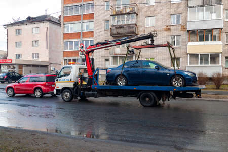 Petrozavodsk, Russia - 24 April 2020. a tow truck drives a car around the city that violates Parking...