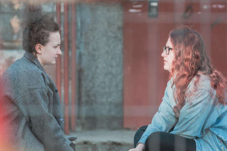 Petrozavodsk, Russia - 6 May 2020. Two young girls talking to each other