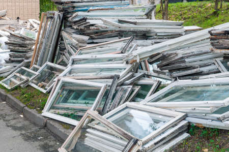 lots of old window frames uninstalled for replacementの写真素材