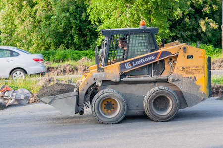 Petrozavodsk, Russia - 8 Juny 2020. mini road loader in motion blurのeditorial素材