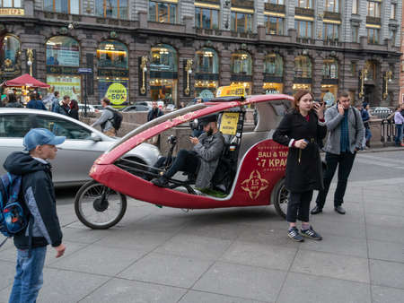 red pedicab on the streetのeditorial素材