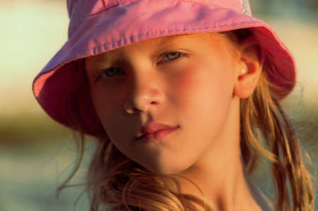 portrait of a little girl in a pink panama. High quality photoの写真素材