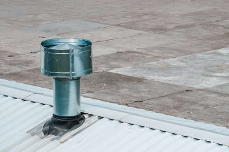 metal ventilation pipe on the roof. High quality photoの写真素材