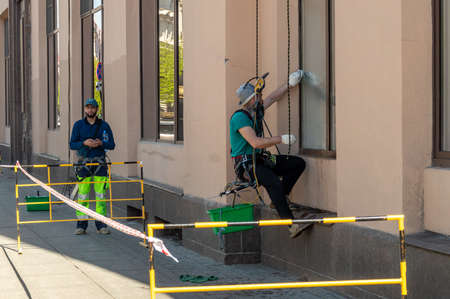 Saint Petersburg, Russia - 14 May 2021. window cleaner on a building