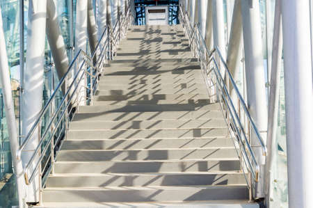 large concrete staircase on a sunny day. the play of light and shadow. High quality photoの写真素材