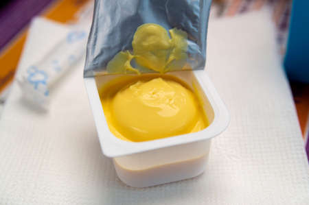 open cheese sauce in portion packs