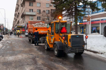 snow removal equipment on the sidewalk