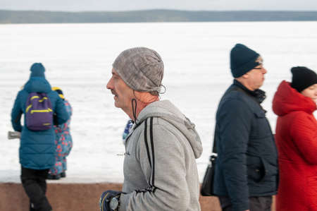 a man runs along the embankmentのeditorial素材