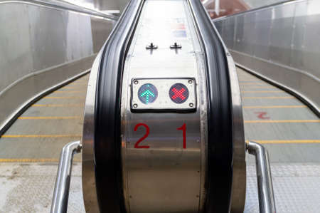 the direction indicator of the escalatorの写真素材