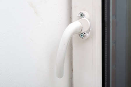 broken handle on the double-glazed windowの写真素材