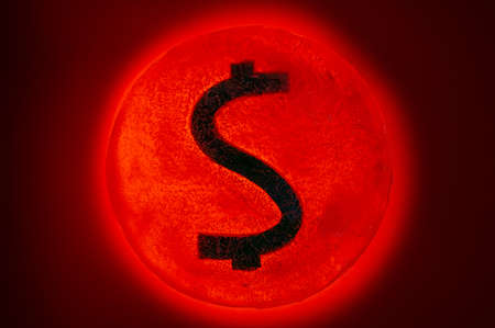 dollar sign on red backgroundの写真素材