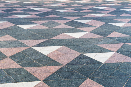 texture of a paved area with tiles. selective focus