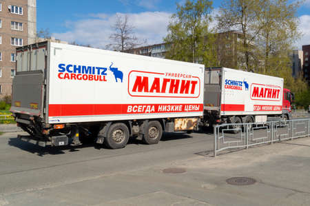 Petrozavodsk, Russia - 21 May 2022. a truck with the of the retailer Magnit. selective focus. motion...