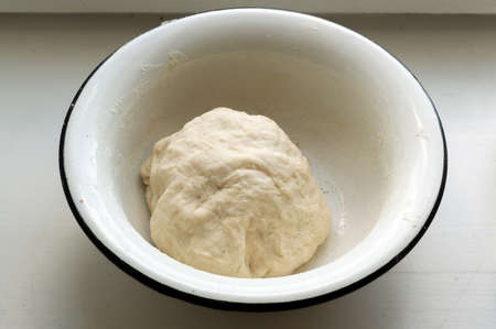 a piece of dough in a bowl
