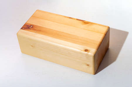 wooden parallelepiped on a white background