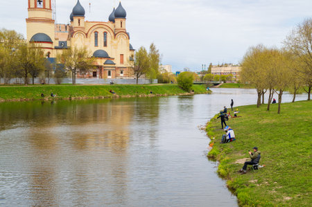 Saint Petersburg, Russia - 7 May 2023. People fishing in the cityのeditorial素材