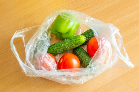 Vegetables in a disposable plastic bagの写真素材