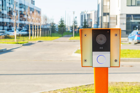 video intercom at the entrance to the parking area near a residential building or office