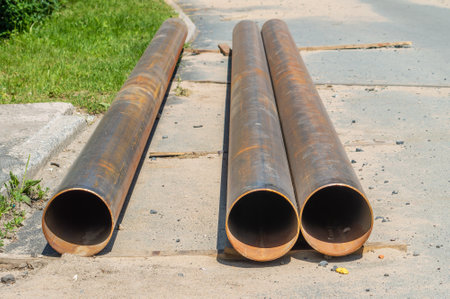 Metal pipes prepared for installation. Pipeline construction