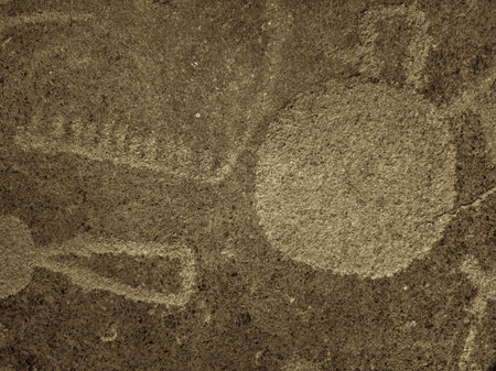 Abstract background with ancient rock paintings. Petroglyphの写真素材