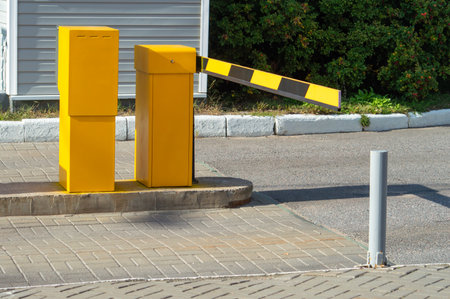 Closed barrier at paid parking. Selective focus