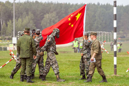 military competition ARMY2018, Chinese army soldier in a chemical protection suit against the...