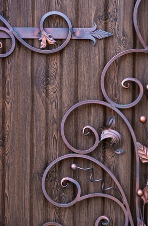 magnificent wrought-iron gates, ornamental forging, forged elements close-upの写真素材
