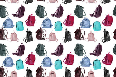 Pattern of various female handbags, clutches and backpacks isolated with blue backgroundの写真素材
