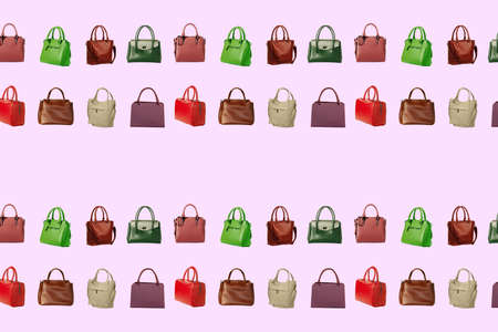 Texture of feminine handbags of different colors isolated on a pink background.seamless pattern of collection women's accessories.の写真素材