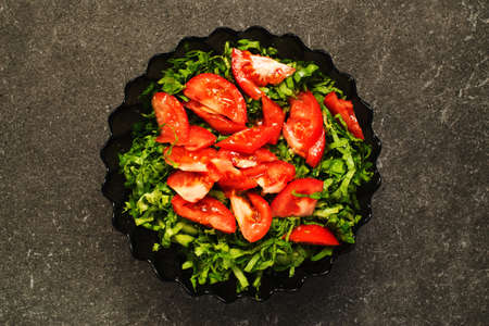 Vegetarian vegetables on kitchen granite black tableの写真素材